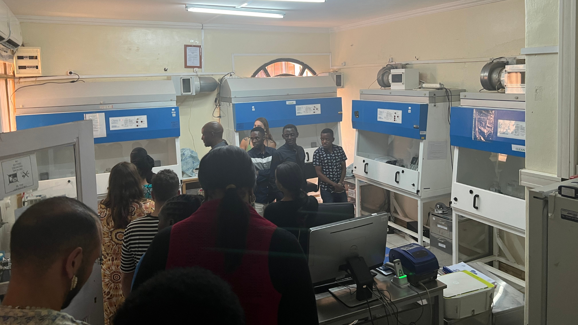 Participants observe specialized hoods for experiments that require additional safety