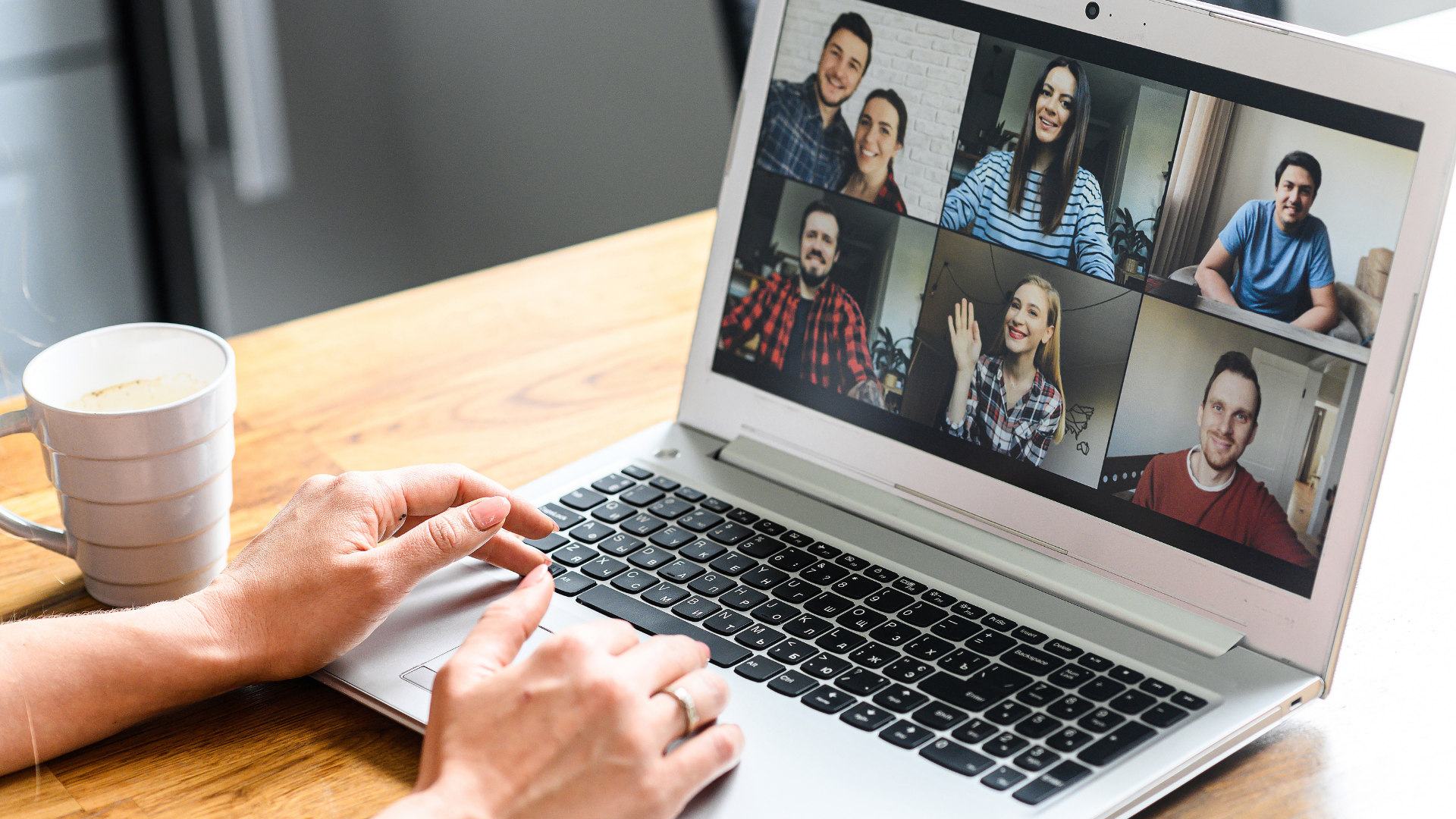 A person connects with a group on a computer screen