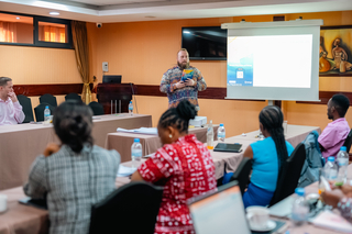 Director Byrd engages Academy participants in a conversation about LGBTQ health issues in Africa and Brasil