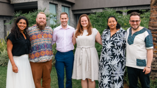 A group posing for a photo, the 2024 Academy for a Cure faculty including Jessica, Samuel, Adam, Gabriela, Sherazaan, and Riccardo